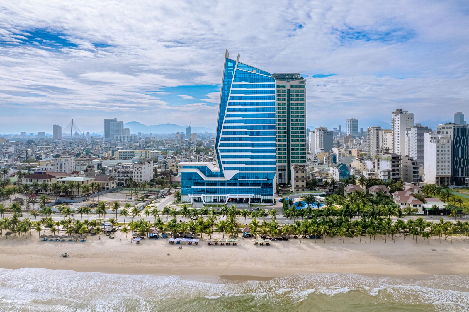 Relaxingly watch the sunrise Da nang right in your room at the beach hotel Da nangGrand Tourane Hotel Danang.
